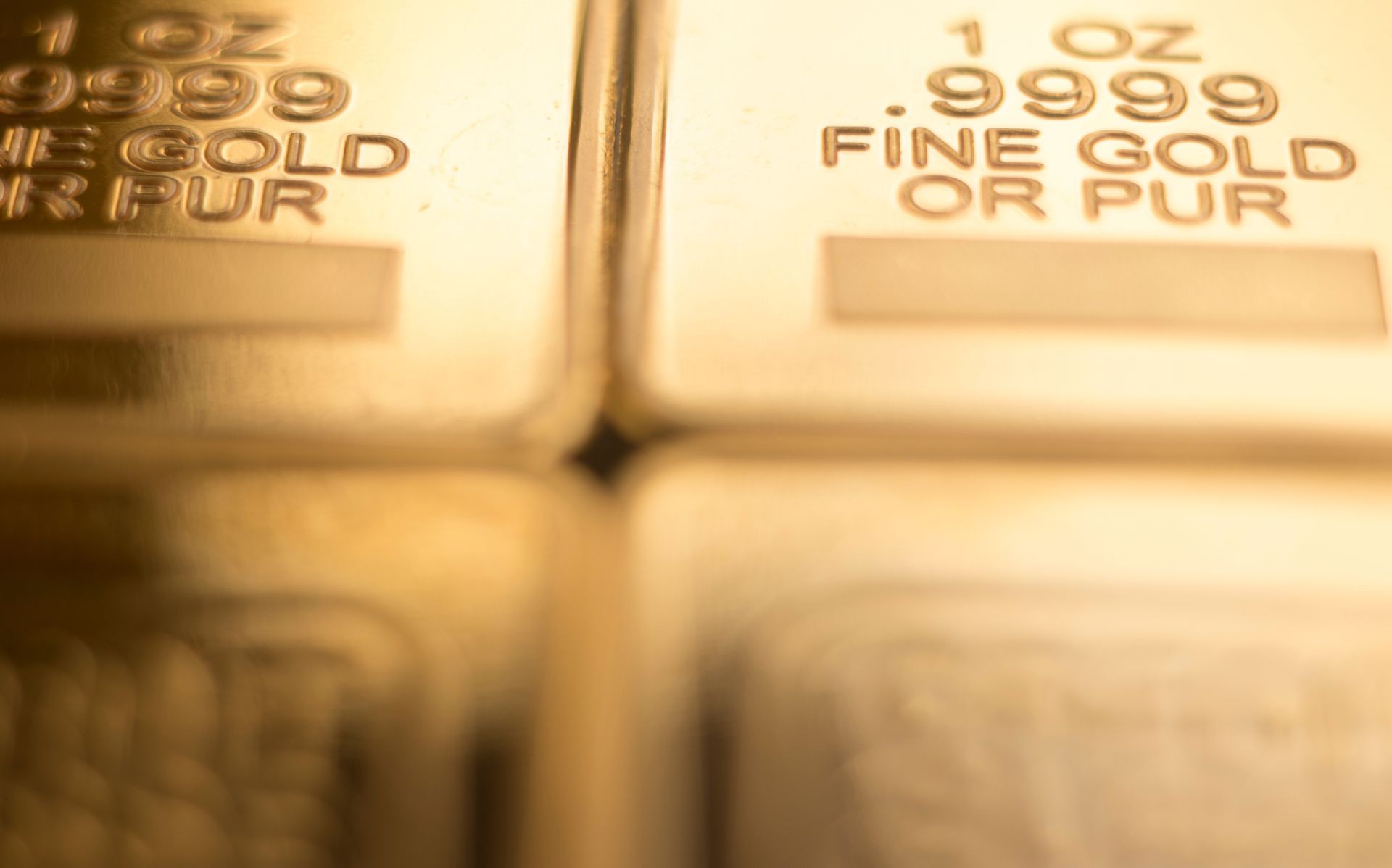 Gold bullion 999.9 purity solid one ounce ingot precious metal bars.